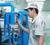Produktion bei Apollo Air-cleaner in Shunde, China. Freudenberg Filtration übernimmt die Mehrheitsanteile des Filterherstellers.